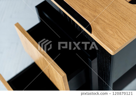 Opened drawer cabinet furniture wooden table at workplace 120870121