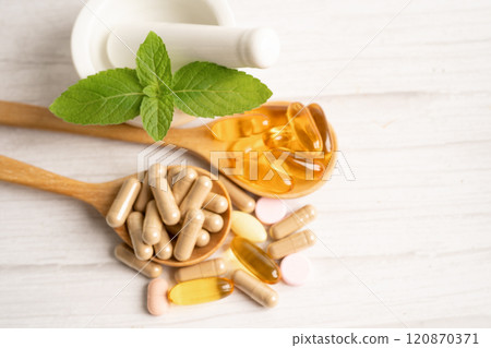 Alternative medicine herbal organic capsule with vitamin E omega 3 fish oil, mineral, drug with herbs leaf natural supplements for healthy good life. 120870371