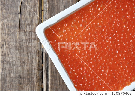 Hokkaido salmon roe marinated in soy sauce in a plastic case Hokkaido salmon roe marinated in soy sauce in a plastic case 120870402