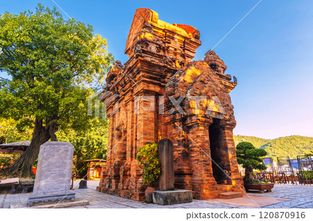 Po Nagar Cham Towers in Nha Trang in Vietnam. A famous tourist landmark with heritage ancient ruins of the Cham temple religion complex Po Nagar Cham Towers in Nha Trang in Vietnam. A famous tourist landmark with heritage ancient ruins of the Cham temple religion complex 120870916
