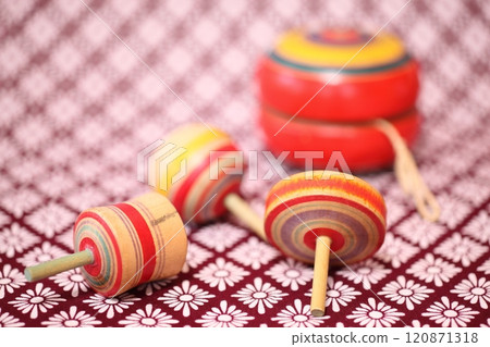 Wooden toy tops and yo-yos Wooden toy tops and yo-yos 120871318
