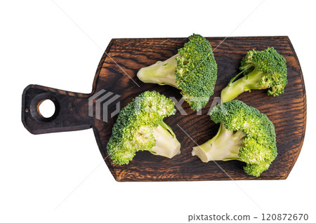 Fresh raw broccoli pieces on a wooden board isolated on white background. top view 120872670