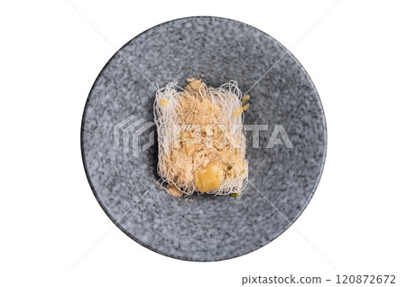Uncooked dry glass noodles with spicy peanut dressing isolated on white background 120872672