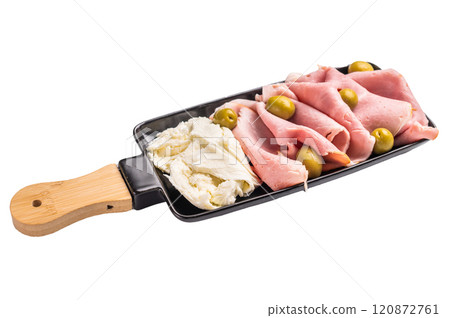 Italian antipasto with Sliced Prosciutto Cotto ham, green olives and mozzarella isolated on white background. top view Italian antipasto with Sliced Prosciutto Cotto ham, green olives and mozzarella isolated on white background. top view 120872761
