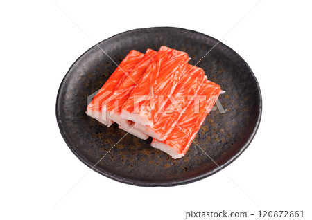 Crab meat stick on plate isolated on the white background. top view Crab meat stick on plate isolated on the white background. top view 120872861