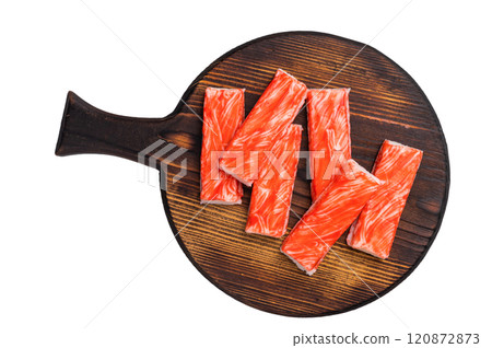 Crab sticks, crabmeat on wooden board isolated on the white background. top view Crab sticks, crabmeat on wooden board isolated on the white background. top view 120872873
