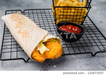Seafood Doner kebab with shrimps, prawns, salad and french fry. grey background. top view 120873097
