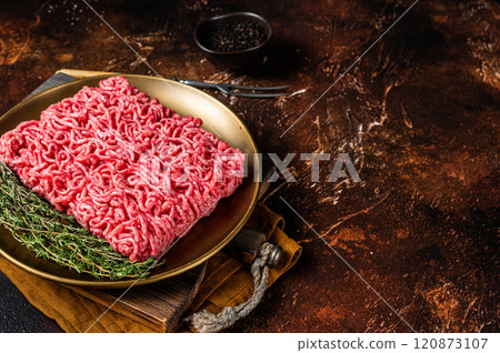 Fresh mutton lamb Mince Meat, raw ground meat. Dark background. Top view. Space for text 120873107