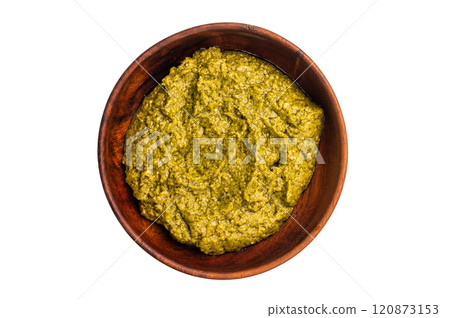 Basil Pesto sauce, Iitalian sauce in a wooden bowl isolated on white background Basil Pesto sauce, Iitalian sauce in a wooden bowl isolated on white background 120873153