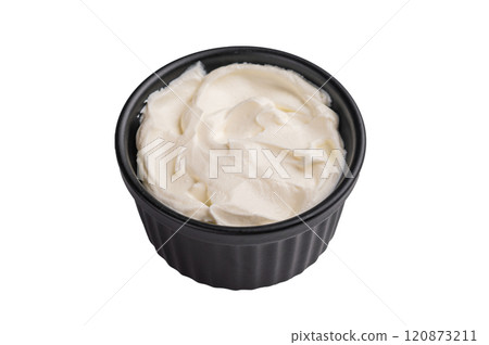 Fresh Sour cream in a bowl isoalted on white background. top view 120873211