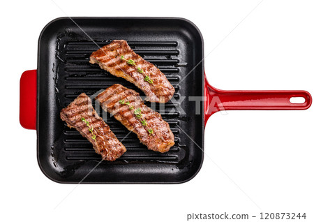 Grilled Tri tip steaks, marbled beef meat on pan with herbs isolated on white background 120873244