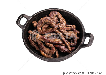 Fried beef tender strips, sliced steak in a skillet isolated on white background Fried beef tender strips, sliced steak in a skillet isolated on white background 120873329