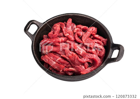 Raw beef meat sliced strips for beef stroganoff isolated on white background Raw beef meat sliced strips for beef stroganoff isolated on white background 120873332