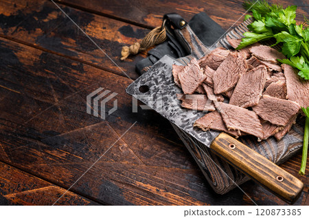 Corned sliced beef meat on wooden cutting board. wooden background. top view 120873385