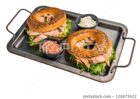 Fresh cooked Bagel sandwich with smoked salmon, lettuce and cream cheese in steel tray isolated on white background 120873422