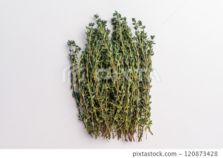 Fresh thyme sprigs bunch isolated on white background. top view Fresh thyme sprigs bunch isolated on white background. top view 120873428