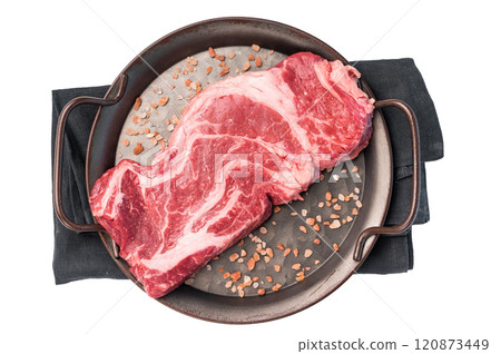 Uncooked Raw Chuck eye roll steak, prime beef meat in kitchen tray isolated on white background Uncooked Raw Chuck eye roll steak, prime beef meat in kitchen tray isolated on white background 120873449