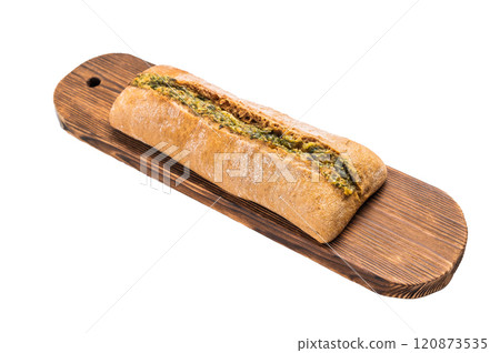 Garlic bread with herbs on wooden cutting board isolated on white background Garlic bread with herbs on wooden cutting board isolated on white background 120873535
