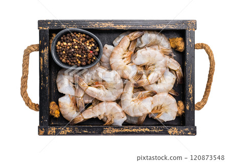 Raw white shrimps, headless fresh prawns in a tray isolated on white background. Raw white shrimps, headless fresh prawns in a tray isolated on white background. 120873548