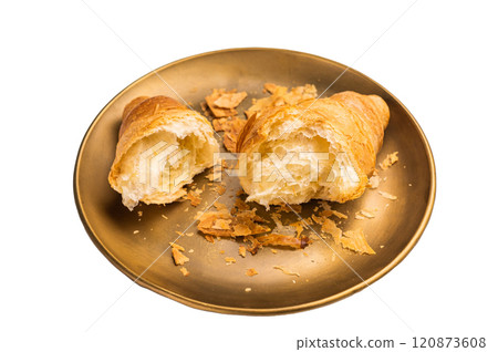 Broken fresh baked French croissant isolated on white background. Broken fresh baked French croissant isolated on white background. 120873608