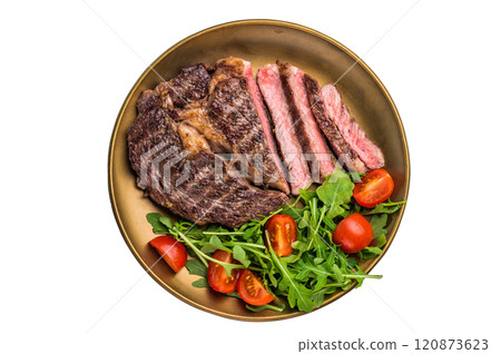 Rib eye steak with herbs in a plate with salad, grilled prime beef meat isolated on white background 120873623