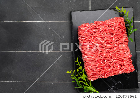 Raw beef and pork mince meat, mincemeat, on black background. 120873661