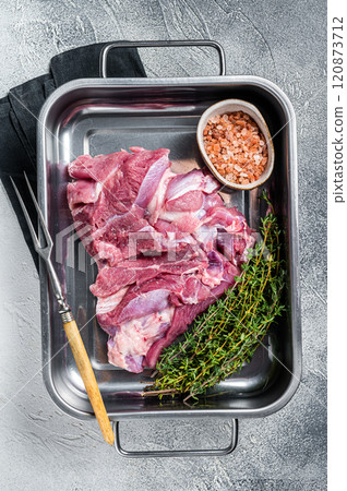 Ready for cooking raw Turkey thigh fillet meat. White background. Top view Ready for cooking raw Turkey thigh fillet meat. White background. Top view 120873712