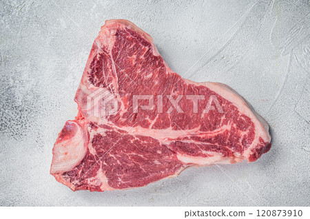 Porterhouse T-bone raw beef meat Steak. White background. Top view Porterhouse T-bone raw beef meat Steak. White background. Top view 120873910