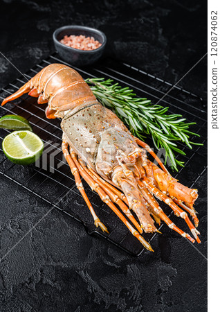 Boiled Spiny lobster or sea crayfish ready for eat. Black background. Top view Boiled Spiny lobster or sea crayfish ready for eat. Black background. Top view 120874062