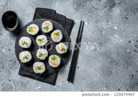 Korean style sushi Kimbap or gimbap made from steamed white rice. Gray background. Top view. Copy space 120874407