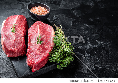 Raw wagyu oyster top blade steaks, organic beef meat. Black background. Top View. Copy space 120874525