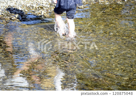 Children playing on the river Children playing on the river 120875048