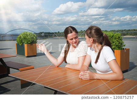 Girls look at people with disapproval 120875257
