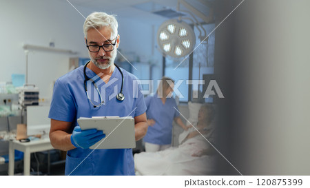 Hospital doctor reviews a old patient's medical report, delivering bed news. Old patient suffering from pain. 120875399