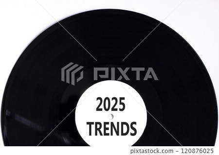Planning 2025 trends new year symbol. Concept words 2025 Trends on beautiful white and black vinyl disk. Beautiful white background. Business 2025 trends new year concept. Copy space. 120876025