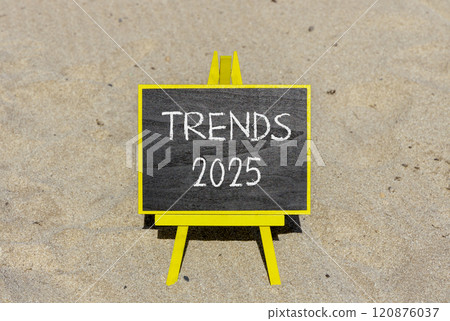 Planning trends 2025 new year symbol. Concept words Trends 2025 on beautiful yellow chalk blackboard. Beautiful sand beach background. Business trends 2025 new year concept. Copy space. 120876037