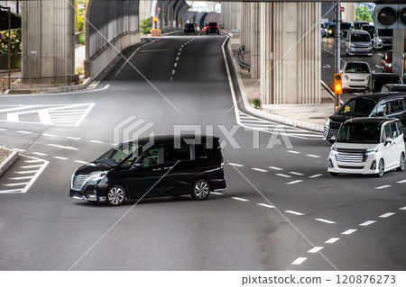 Car turning right at an intersection Car turning right at an intersection 120876273