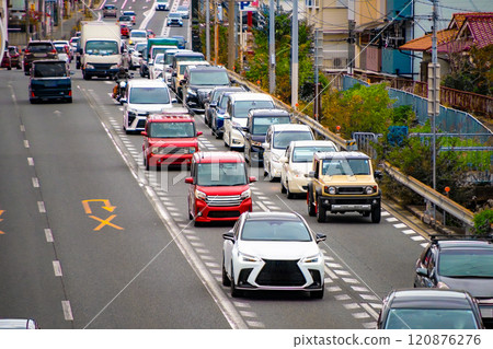 A line of cars jammed on a national highway during the rush hour 120876276