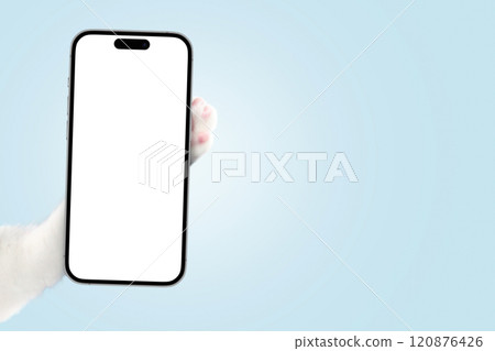 White cat paw holding smartphone mockup on blue background. Creative animal advertising, concept. Application ad and free copy space for design. Funny cat holds a smartphone in its paw and shows 120876426