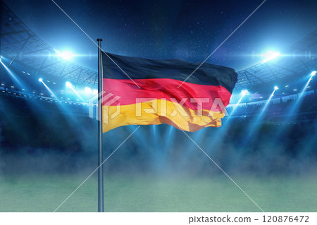 beautiful modern sports stadium with a green grass field with Germany flag shines with blue spotlights at night with stars. Sports tournament, European Football Championship 2024 in Germany 120876472