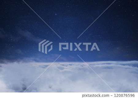 Beautiful starry sky space with clouds, concept. Traveling above the clouds. Flight 120876596