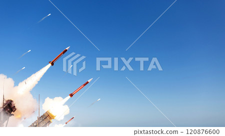 Missile launch and air defense protection on a blue background. War and attack, concept. Military actions 120876600