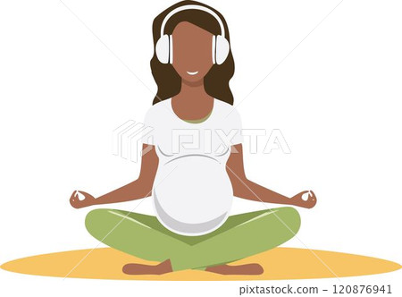 Pregnant woman in white headphones doing yoga Pregnant woman in white headphones doing yoga 120876941