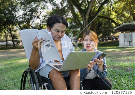 Young Disabled Businessman Collaborates with Colleagues Outdoors in a Modern Professional Setting Young Disabled Businessman Collaborates with Colleagues Outdoors in a Modern Professional Setting 120877159