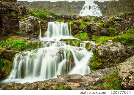 Dynjandi is one the most famous waterfall of the West Fjords of Iceland at summer Dynjandi is one the most famous waterfall of the West Fjords of Iceland at summer 120877634