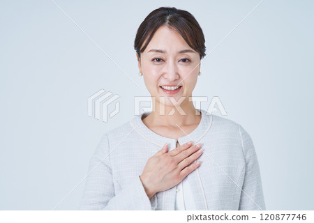 Business woman putting hand on chest Business woman putting hand on chest 120877746