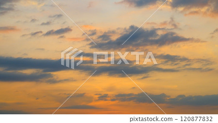 Sunrise sky with lighted clouds. 120877832