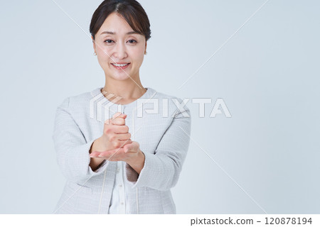 Business woman nodding with both hands 120878194