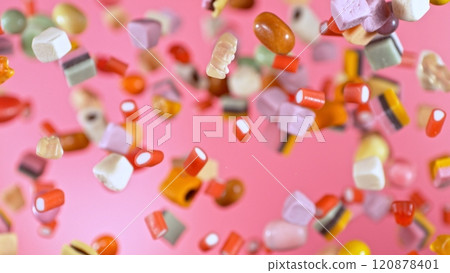 Freeze motion of flying various kind of candies. 120878401