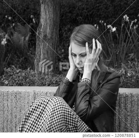 Sad girl in the park Sad girl in the park 120878851